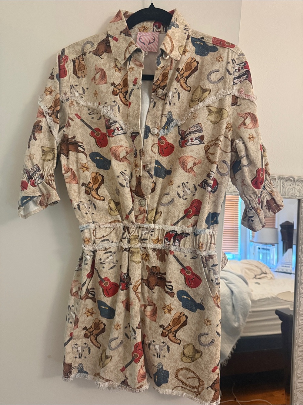 Fantastic Fawn Beige Western Print Romper with Red & Blue Accents
